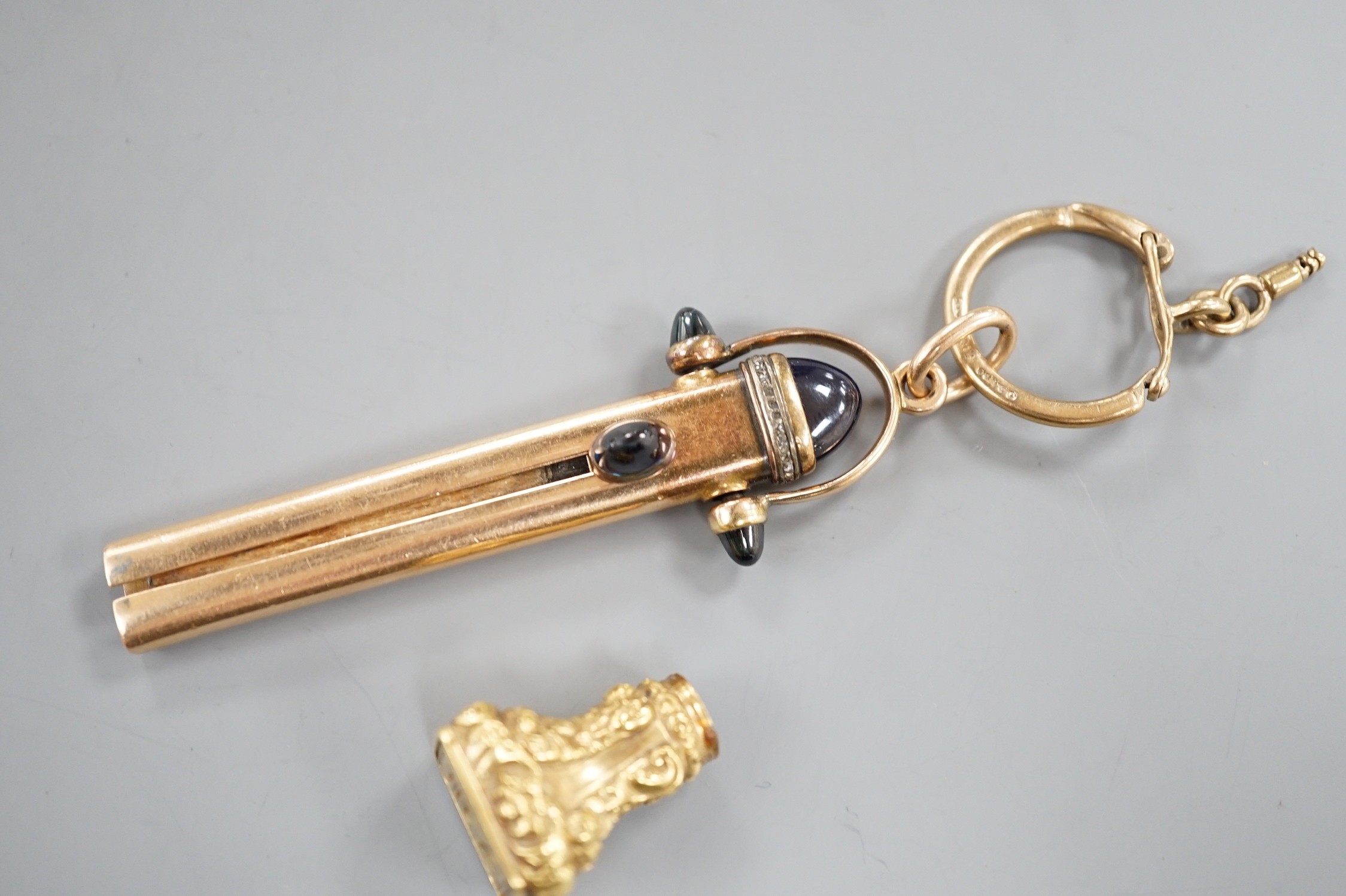 An early 20th century Russian 56 zolotnik yellow metal, four stone blue cabochon and rose cut diamond set propelling pencil holder, maker's mark, HW? overall 79mm, gross 18.7 grams, hung from a 9ct gold key ring, 3.8 gra